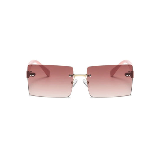 Ορθογώνια Γυαλιά Ηλίου Ameli της Exposure Sunglasses με προστασία UV400 σε ροζ χρώμα σκελετού και ροζ φακό.