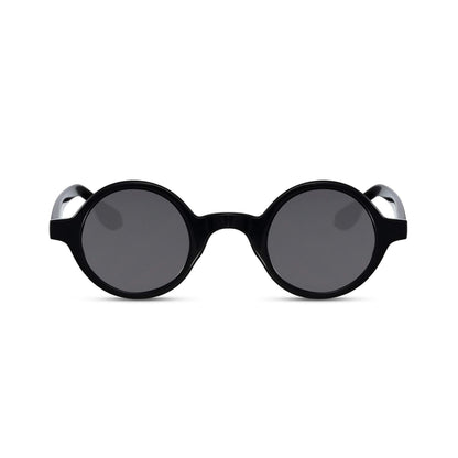 Στρογγυλά Γυαλιά Ηλίου Aurora της Exposure Sunglasses με προστασία UV400 σε μαύρο χρώμα σκελετού και μαύρο φακό.
