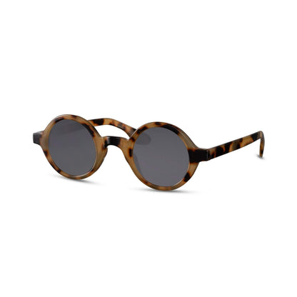 Στρογγυλά Γυαλιά Ηλίου Aurora της Exposure Sunglasses με προστασία UV400 σε καφέ χρώμα σκελετού και μαύρο φακό.Πλάγια προβολή